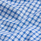 Cobalt plaid fabric close-up - Thomas Mason archive Albini-woven 100s poplin