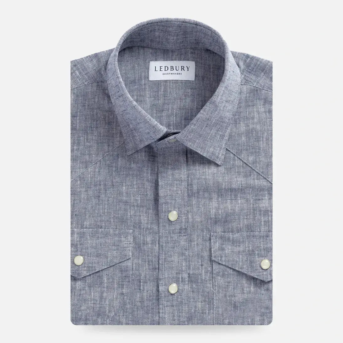 Navy blue Sandoval western custom shirt flat lay - Ledbury pearl snap western shirt