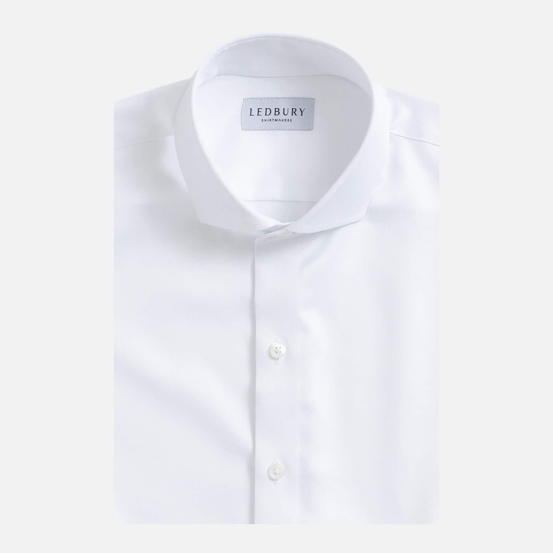 White non-iron tuxedo shirt flat lay - removable button band detail