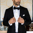 Man wearing white tuxedo shirt - non-iron formal dress shirt for events