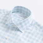 Green plaid dress shirt collar detail - lightweight cotton construction