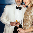 Man wearing white tuxedo shirt - pleated front non-iron formal dress shirt