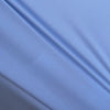 Ice blue Canon performance twill fabric close-up  stretching - nylon spandex blend texture