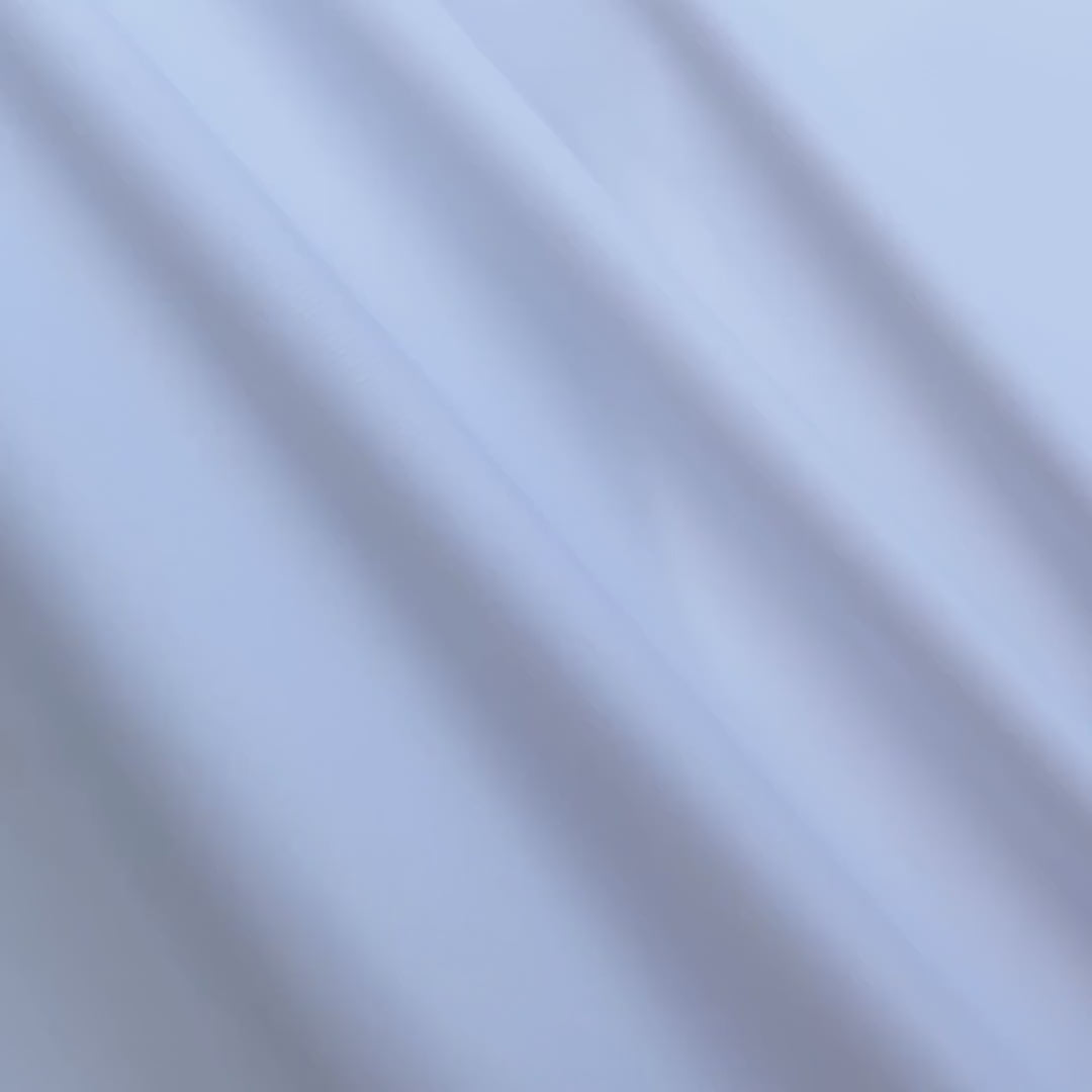 White Canon performance twill fabric stretching close-up - nylon spandex blend texture