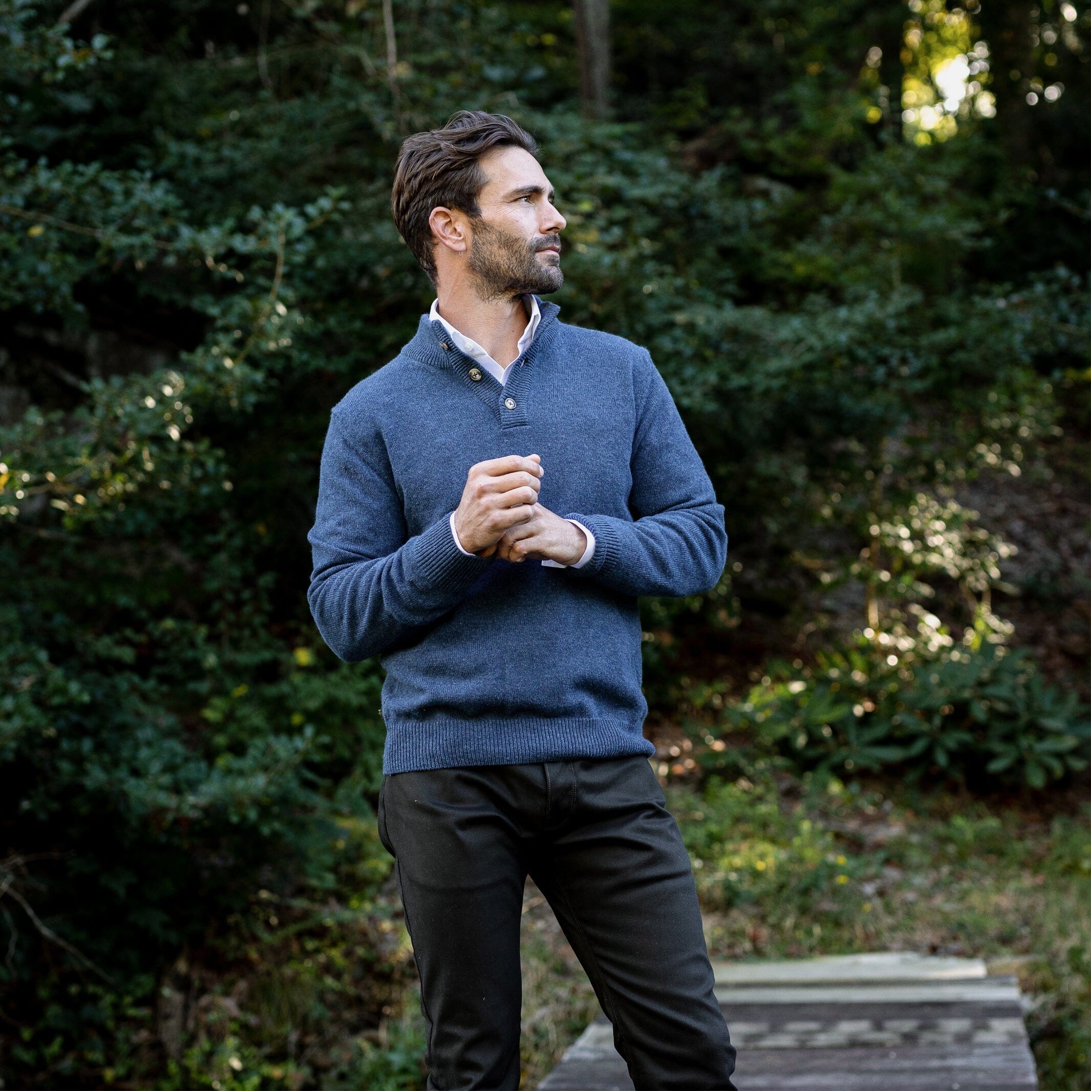 Blue Heather Brewer Mock Neck Sweater worn outdoors in lifestyle setting