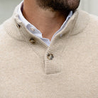 Three-button ribbed mock collar detail on the Camel Heather Brewer Mock Neck Sweater