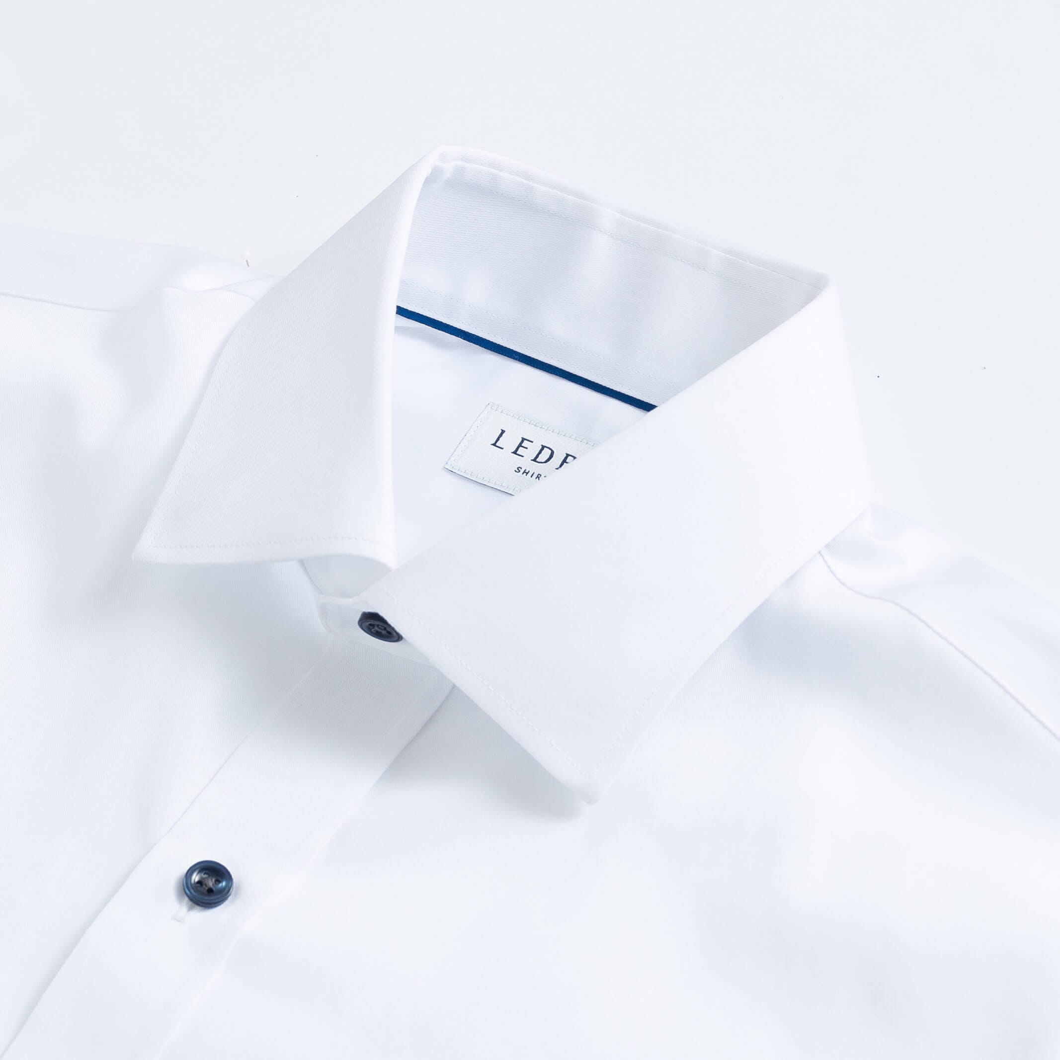 White dress shirt collar with navy button detail - fine twill custom shirt